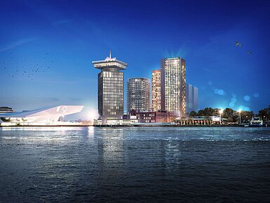 Maritim Hotel Amsterdam at night with skyline view and the IJ river