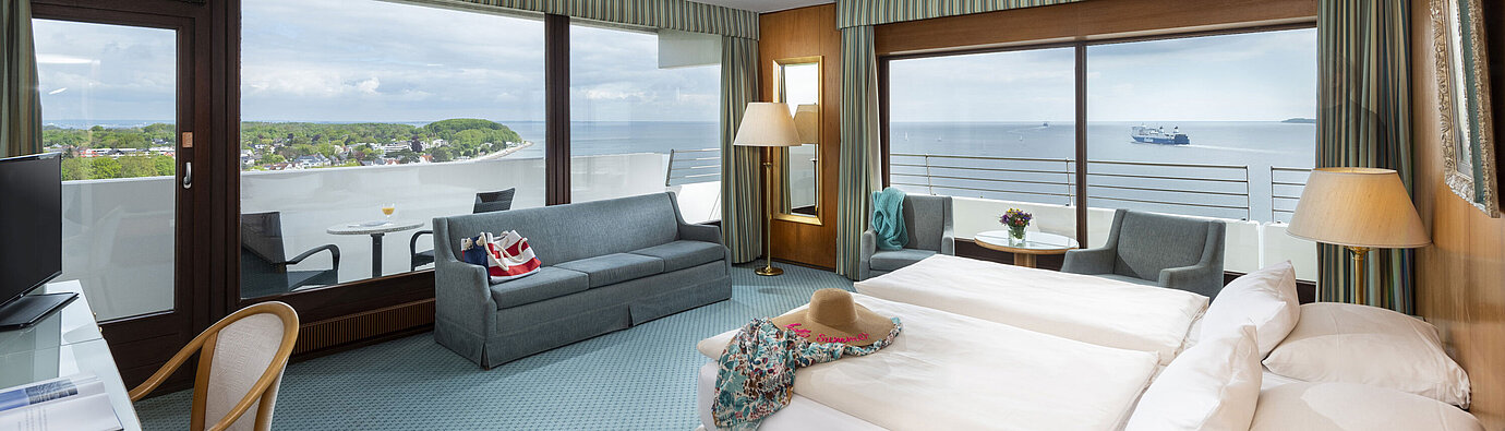 Spacious room at Maritim Hotel Travemünde with views of the Baltic Sea and harbour