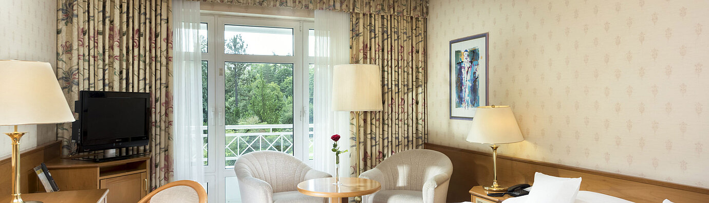 Comfort room Bright double room with balcony view and seating area at Maritim Hotel Bad Wildungen