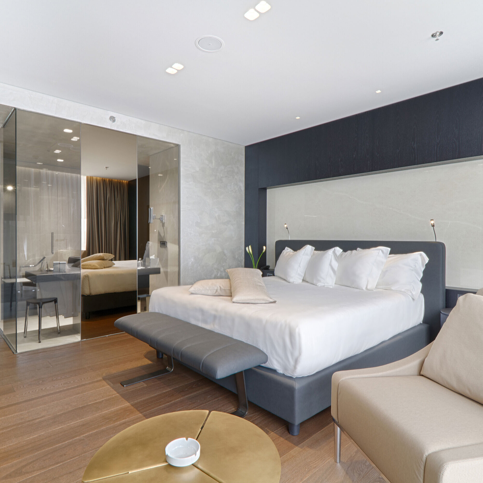 Superior room Spacious double room with armchair, glass partition and modern design at Maritim Hotel Plaza Tirana