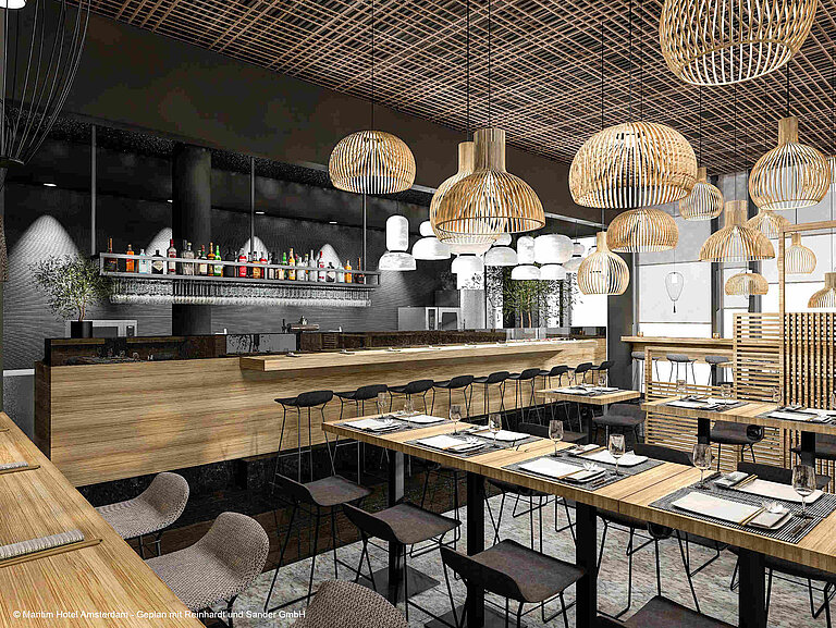 Modern restaurant at Maritim Hotel Amsterdam with stylish interior and set tables
