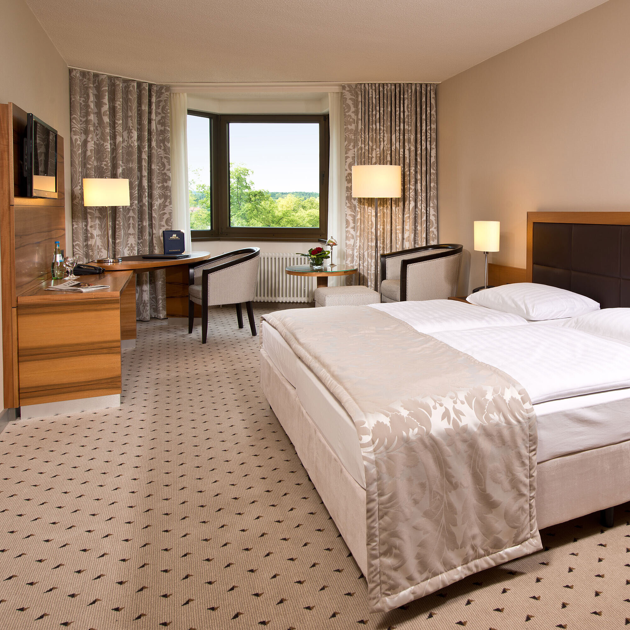 Superior room Comfortable hotel room at Maritim Hotel Bad Homburg with modern design and green view.